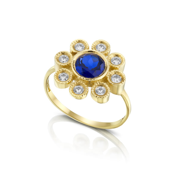טבעת זהב 14K בעיצוב פרח בשיבוץ יהלומים וזירקון כחול רויאל
