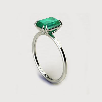 טבעת אירוסין בזהב 14K ( אמרלד/ספיר) עם בחיתוך אמרלד קאט בגודל 2 קראט בשיבוץ אבן חן טבעית