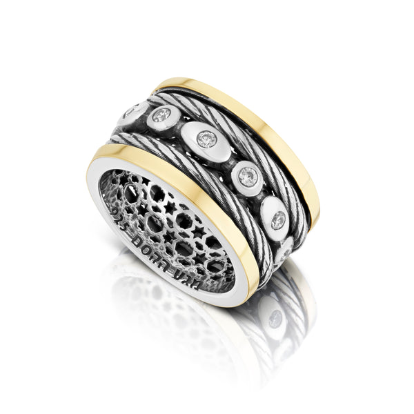 טבעת כסף בשילוב זהב מסתובבת עם שיבוצי זירקון לבן